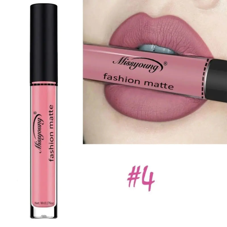 A tube of Léa Beauty & Cosmetics Non-Stick Matte Liquid Lipstick Lip Gloss Makeup in shade #4 is displayed next to lips wearing the same bold matte pink, showcasing its vivid color and smooth matte finish.