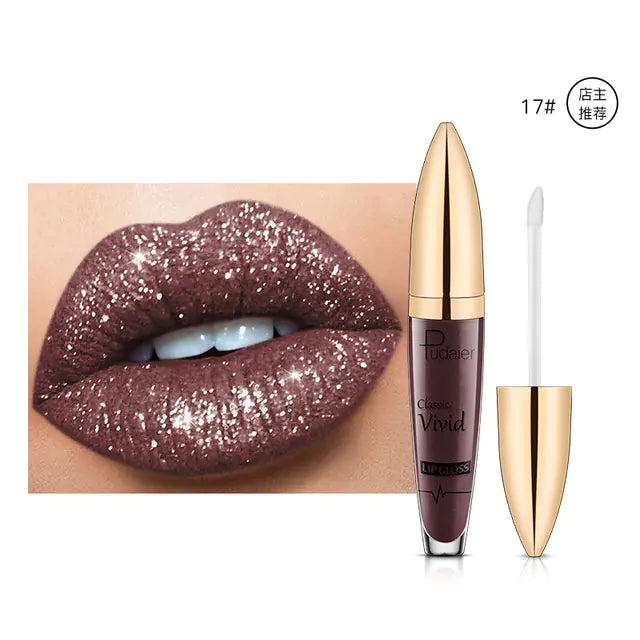 A close-up of lips wearing sparkly brown Pearlescent Matte Lip Gloss Non-Stick Long Lasting Makeup by Léa Beauty & Cosmetics. Beside them is a matching tube with gold cap and white applicator, enhancing the dazzling glitter effect on the lips.