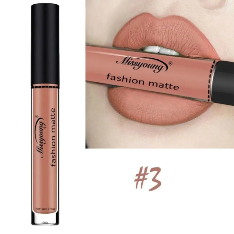 A tube of Léa Beauty & Cosmetics Non-Stick Matte Liquid Lipstick Lip Gloss Makeup in shade #3 is shown, with a close-up of lips wearing the same flawless nude matte color, the lipstick gently held between the lips.