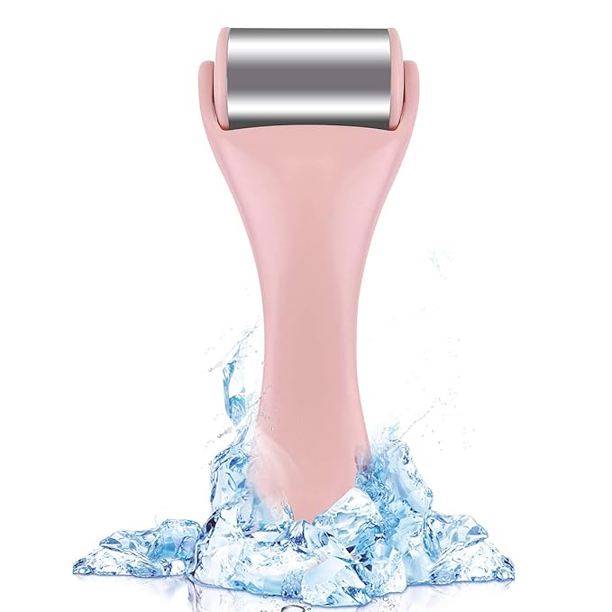 The My Store Roulette de glace, featuring a pink handle and metallic roller head, stands upright among splashing ice and water to showcase its instant cooling effect and refreshing sensation.