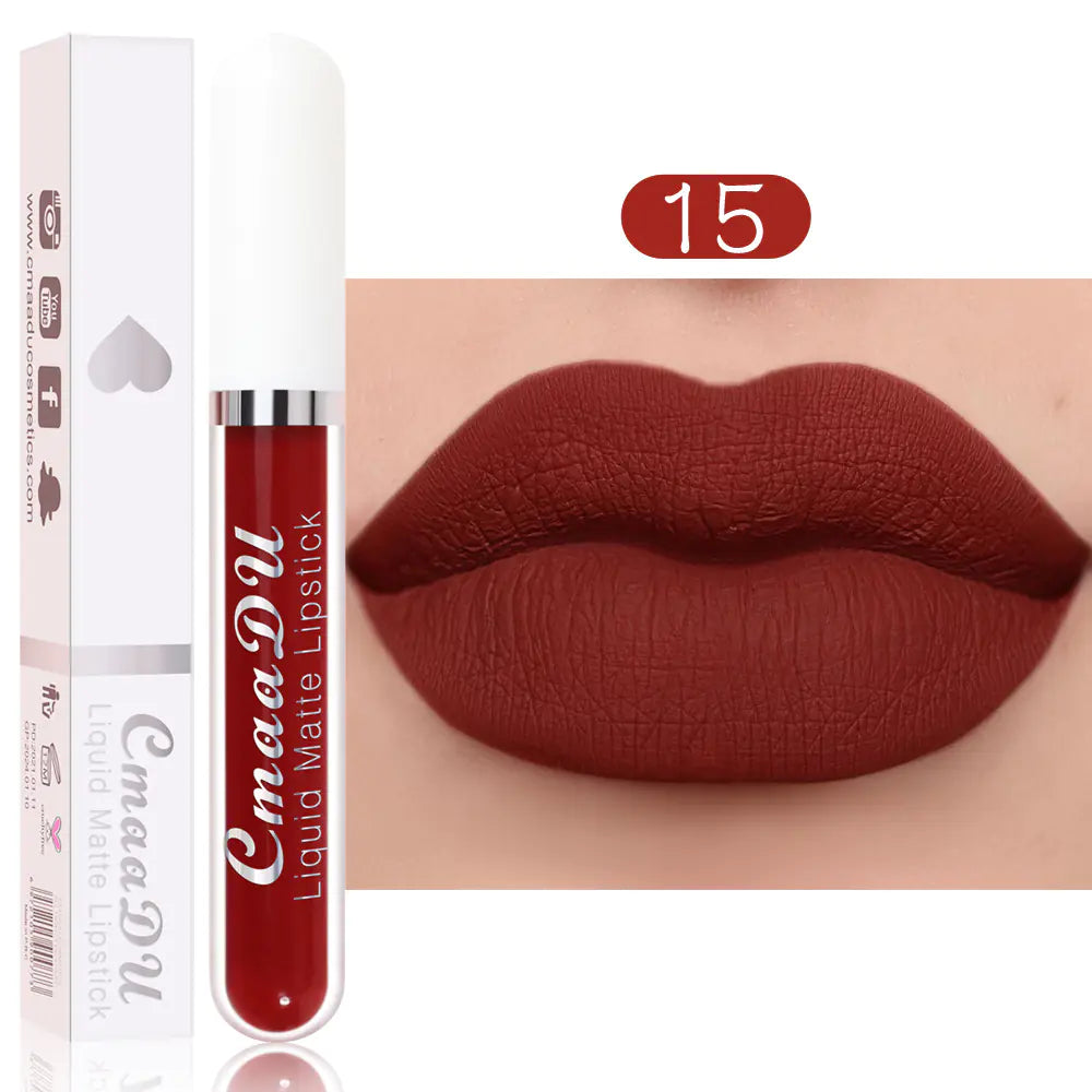 A tube of Léa Beauty & Cosmetics Matte Non-Stick Waterproof Long-Lasting Lip Gloss in shade 15 deep red appears beside lips wearing the same color. This gloss comes boxed and delivers bold, lasting color without sticking.