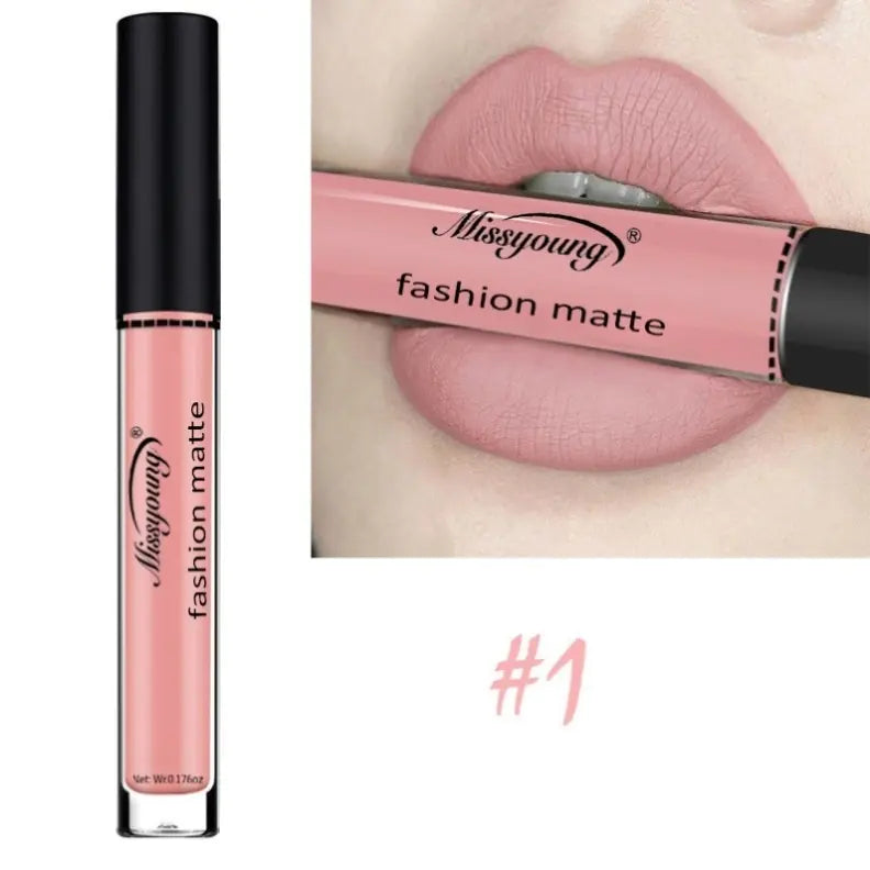 A tube of Léa Beauty & Cosmetics Non-Stick Matte Liquid Lipstick Lip Gloss Makeup in soft pink is shown next to lips wearing the same shade. The lipstick is labeled #1 on the image.